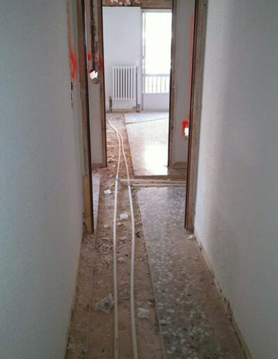 obra tuberias agua suelo calefacción
